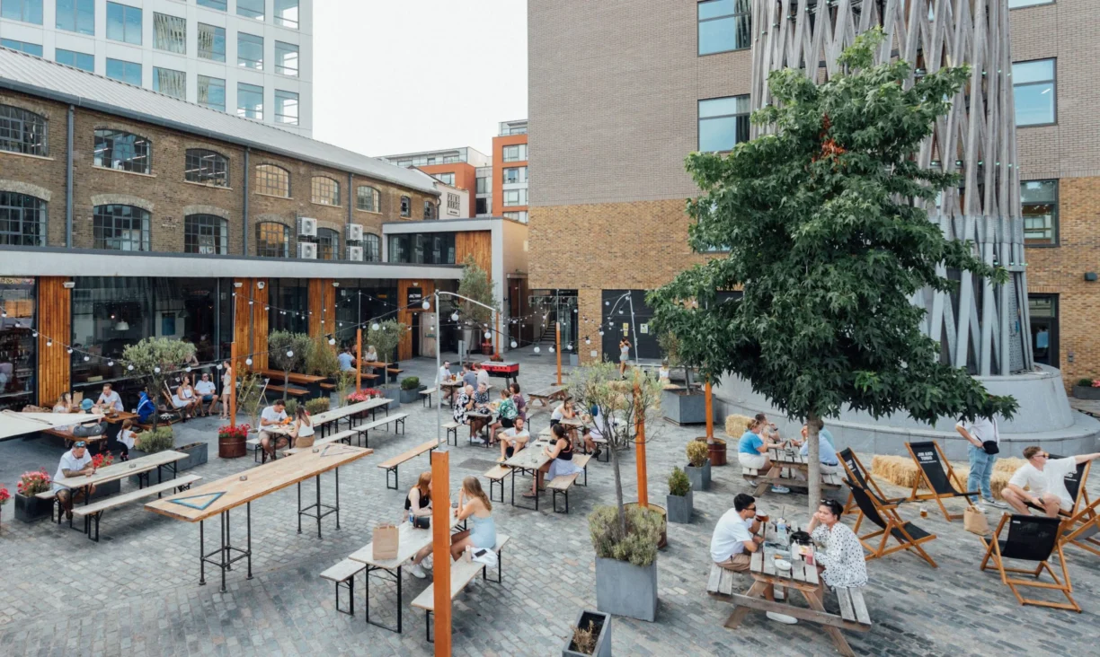 the print house - people sitting at tables outside
