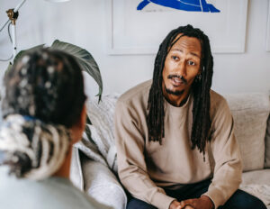Man talking to counsellor